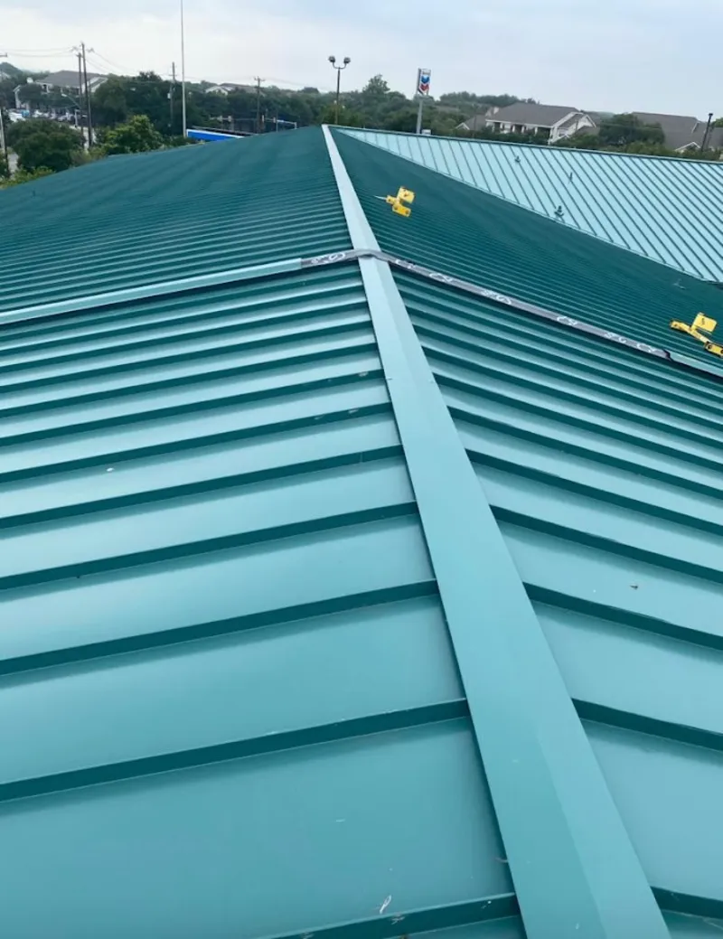 Green commercial metal roof ridge and valley for Metal Roof Repair in Wilkins